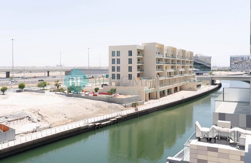 Al Raha Beach Apartamento | Cozy Canal View Apartment - 206