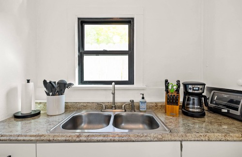 North End Cabaña | Cozy cottage in North End on tree-lined street.