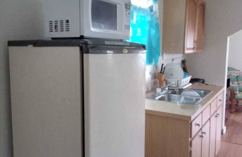 Andros Town Casa | Cozy cottage with AC, Washer & dryer, spacious, situated on the beach.