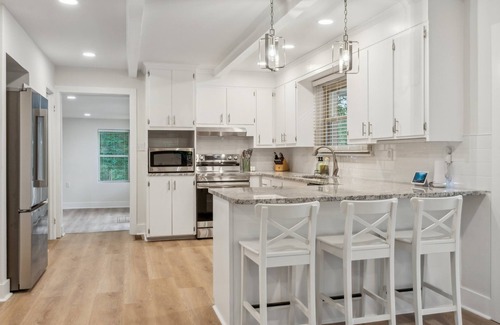 Southmont Casa | Cozy Cove-Lakefront home with kayaks, paddle board, lillypad, arcade, & fire pit