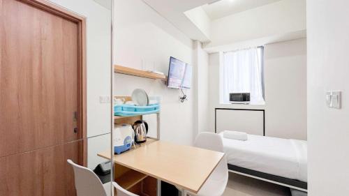 Makassar Apartamento | Cozy Designed Studio (No Kitchen) Bandaraya - Tallasa City Makassar Apartment By Travelio