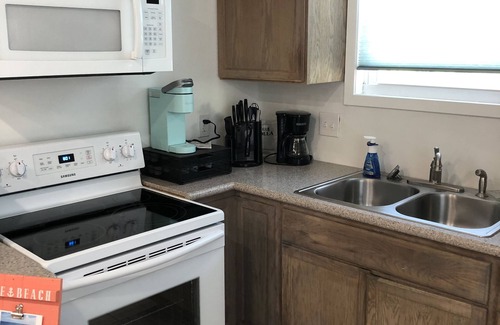 Galveston Apartamento | Eficiencia acogedora Ubicación central: cerca de la playa, zonas comerciales y restaurantes