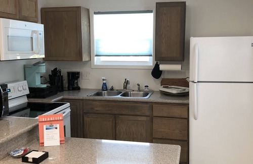 Galveston Apartamento | Eficiencia acogedora Ubicación central: cerca de la playa, zonas comerciales y restaurantes