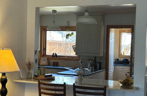 Northwest Calgary Casa | Cozy home in a quiet neighbourhood among old trees. 10 min drive to city centre.