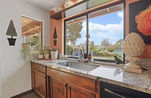 Stockton Casa | Cozy Home on a Lake and a sparkling pool with lush garden and Dock!