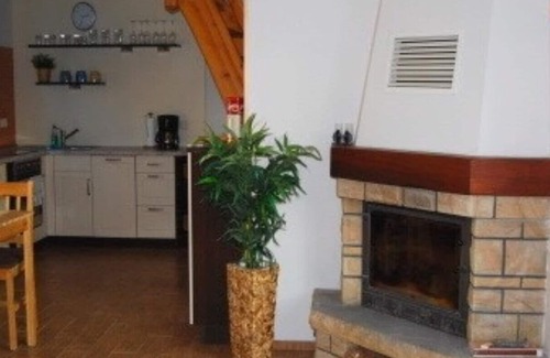 Muritz Casa | Cozy house with a fireplace and a large garden