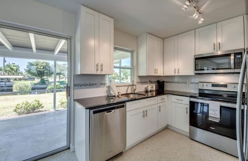 Pelican Casa | Cozy in the Cape, Heated Saltwater Pool & Gulf access, water view