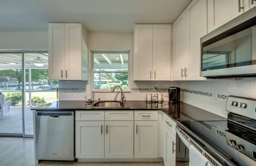 Pelican Casa | Cozy in the Cape, Heated Saltwater Pool & Gulf access, water view