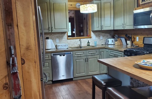 Kalkaska Cabina | Cozy lake front cabin on 6 private acres