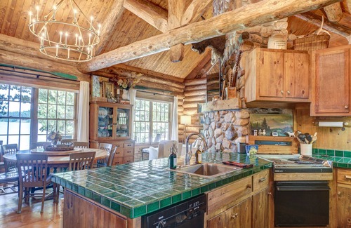 Spooner Cabina | Cozy Lake front luxury, hot tub, ice fish, snowmobile, fireplace, screened porch