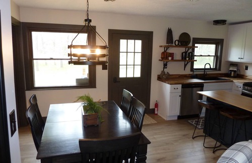 Irons Otro | Cozy Lodge on 10 acres- Sleeps 9, Newly Renovated, Game Room, Lg Deck, Irons MI.