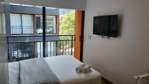 Chico Norte Apartamento | Cozy loft in chico near 93 park taj 97