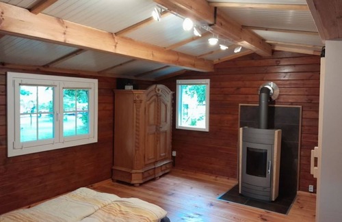 Oberhavel Cabina | Cozy log cabin for 1-2 people in an absolutely quiet location with lake access.