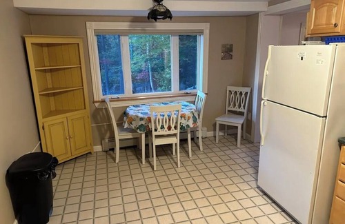 Lucerne-in-Maine Cabina | Cozy Log Home across from Phillips Lake-Four Season Fun