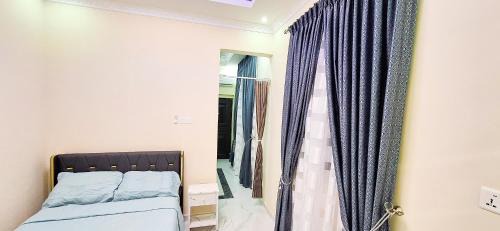 Asylum Down Apartamento | Cozy Luxury Hideouts in North Ridge, 10 mins from the Airport & Tang Palace, 5 mins from Alisa Hotel, Kempinski & Movenpick, close to Supermarkets & Tourist Attractions