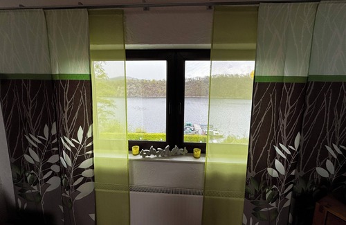 Simmerath Apartamento | Cozy maisonette vacation apartment no. 4 for 2-3 persons each with lake view