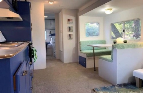 Topanga Casa | Cozy Mallard RV. Light, bright and inspiring trailer amongst the Pine trees.