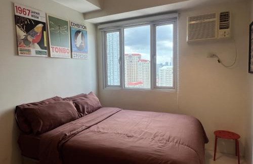 Valencia Apartamento | Cozy Nook l Accessible LRT QC l Wifi & Netflix