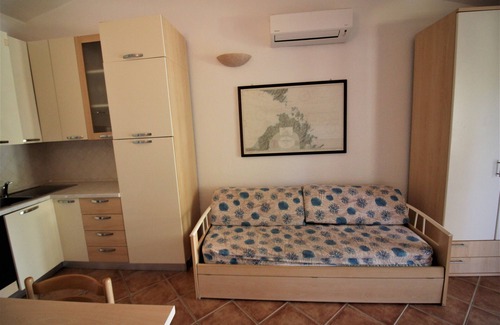 Porto Pollo Apartamento | Cozy one-bedroom apartment in Porto Pollo "Il Borgo" 300 m from the beach