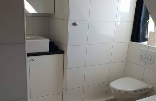 Hafnarfjordur Apartamento | Acogedor ático con hermosa vista al mar.