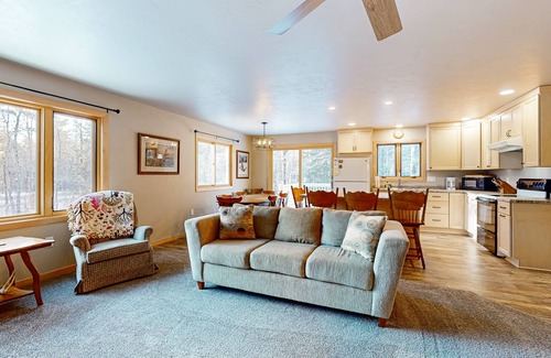 Presque Isle Casa | Cozy tree-lined home located near town, lakes, walking & bike trails, w/ firepit