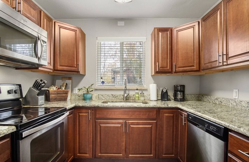 Berkley Casa | Cozy two bedroom home with beautiful landscaped yard.