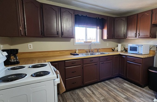 Celina Casa | Cozy updated home w/channel access, deck, firepit & huge yard!