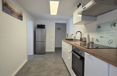 Gross Stroemkendorf Apartamento | Cozy vacation apartment "Ankerplatz" in a rural location in Groß Strömkendorf.
