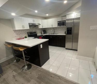 Mississauga Casa | CozyHaven A private entrance, comfy basement apartment in Mississauga with free parking Conveniently located with easy access to the airport downtown Toronto major malls and highways for a seamless stay