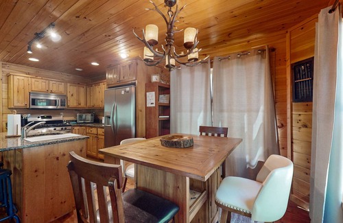 Cherry Log Cabina | Creek Cabin with fenced yard, screened in patio and hot tub