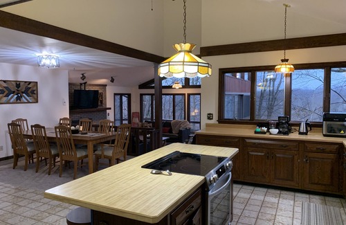 Conneaut Casa | Creek side retreat and breathtaking views! Moments from hunting and fishing!