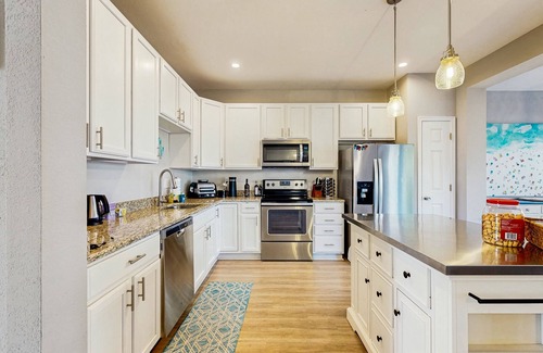 Ocean View Casa | Creekside townhouse with patio, grill & community pool - pet friendly