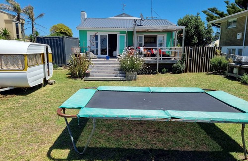 Mount Maunganui Cabaña | Linda casa de campo en la playa frente al monte