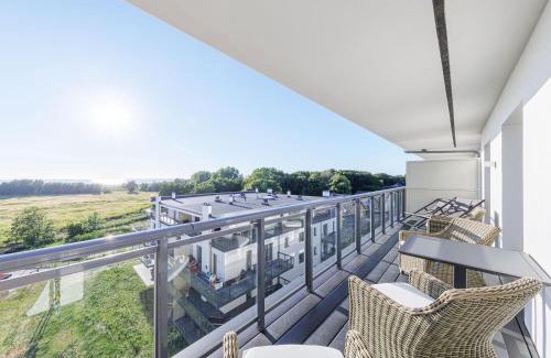 Ostseebad Wustrow Apartamento | Dünenlounge - 5 Sterne Ferienwohnung mit West-Balkon und fantastischem Blick über den Deich