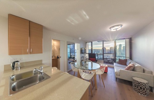Yaletown Condominio | D11 - Un dormitorio amueblado con buen gusto en Yaletown