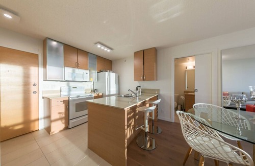 Yaletown Condominio | D11 - Un dormitorio amueblado con buen gusto en Yaletown