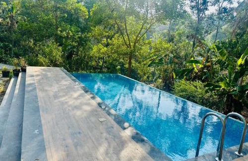 Neyyattinkara Casa | DairyKing Farmhouse