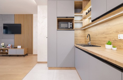 Grzegorzki Apartamento | Dark Blue Apartment in Kraków by Renters