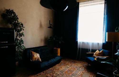 Centrs Apartamento | Dark & Moody Mid Century Apartment