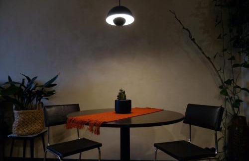 Centrs Apartamento | Dark & Moody Mid Century Apartment