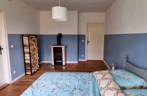 Nauen Apartamento | Das Kaminzimmer im Forsthaus Nauen