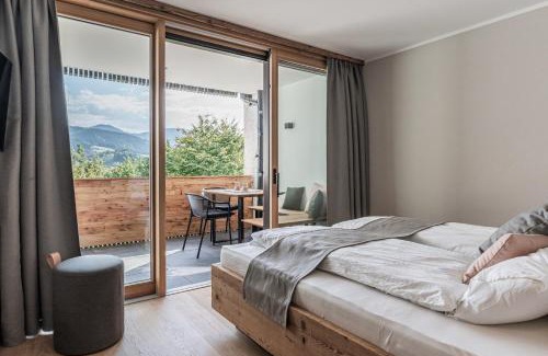 Schliersee Apartamento | DAS KIRCHBICHL - stylisch lässig, mit eigener Sauna