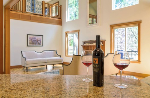 Missoula Cama Y Desayuno | Daylight basement with private living room, gym, bedroom, and restroom.