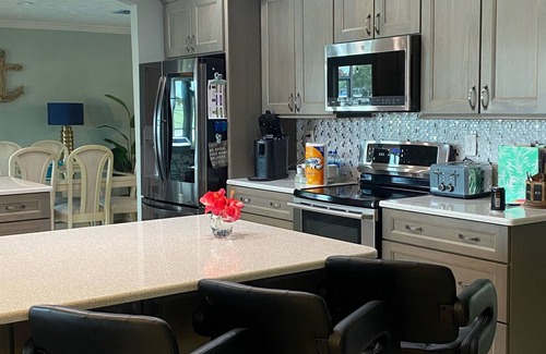 Apollo Beach Casa | Dazzling waterfront home with HEATED saltwater pool in Tampa Bay
