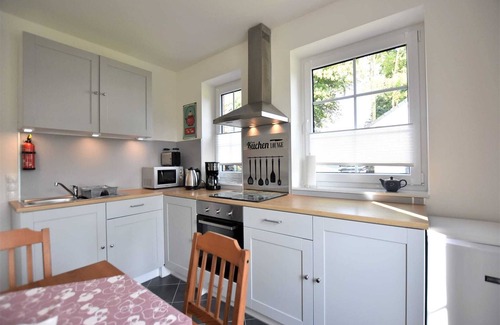 Dannau Apartamento | FeWo Ostsee Oldenburg/Holstein Garten y cochera