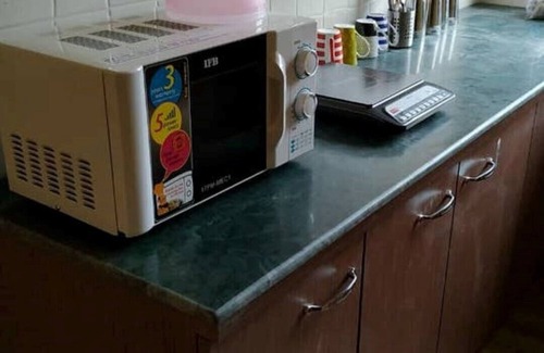 Sualkuchi Apartamento | DekaChang un acogedor apartamento 2BHK, hogar lejos del hogar