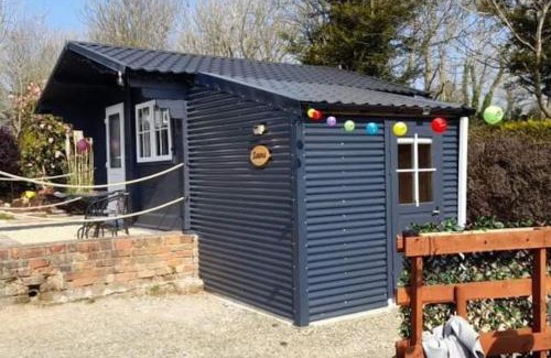 Clonroche Apartamento | Delightful Studio Log Cabin , with Sauna