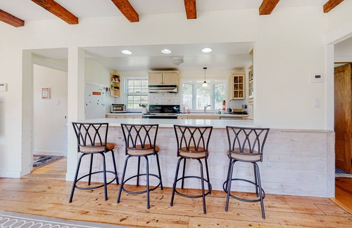 Jamaica Casa | Delightful updated farmhouse with original features, patio, and & W/D
