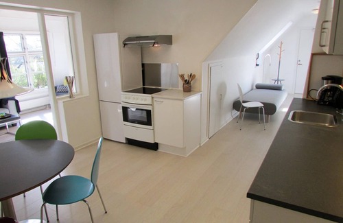 Hovedgard Apartamento | Apartamento de lujo con vistas al jardín - Provstegården Bed & Breakfast