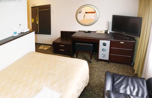 Matsuyama Hotel | Deluxe double Smoking Corner room With massage / Naha Okinawa